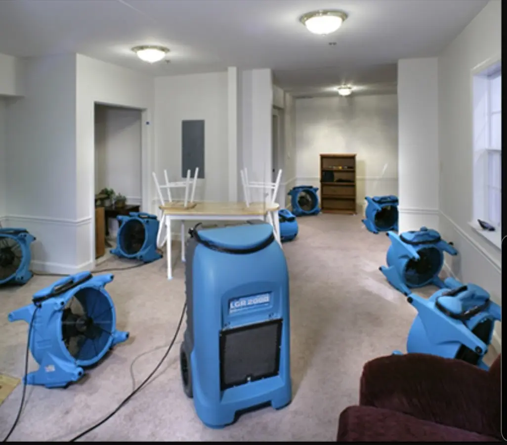 Air movers and dehumidifier setup for Water Damage Restoration in Crockett
